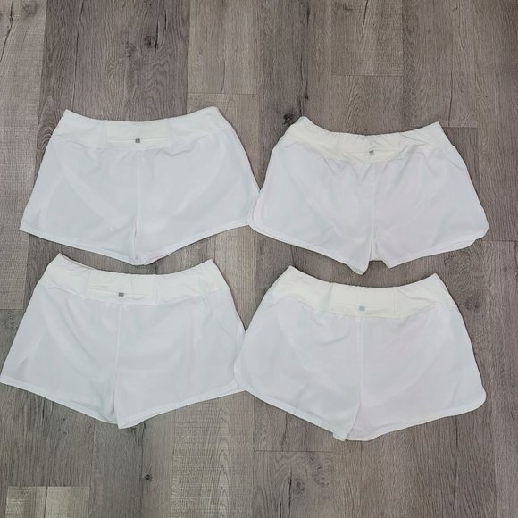 Nike dri fit white running shorts set of 4. pocket on back with lining size Larg - Picture 5 of 13